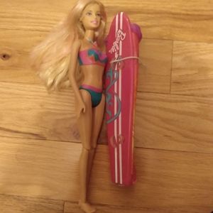 Barbie in a mermaid tail bath toy